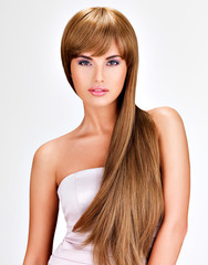 Beautiful indian  woman with long straight brown  hair