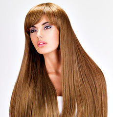 Beautiful indian  woman with long straight brown  hair