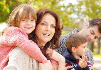 Happy parents with their children