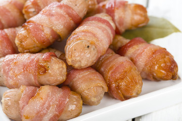 Pigs in Blankets - Sausages wrapped in bacon.