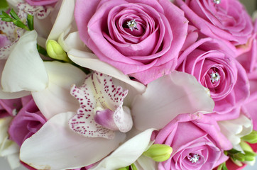 Pink Roses And White Orchid Bouquet
