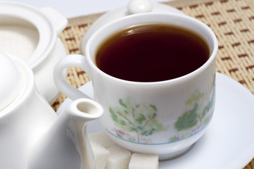 Black tea in a cup on the table