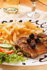 grilled steak with french fries