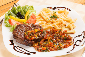 grilled steak with french fries