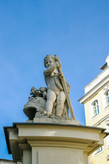Fototapeta na wymiar Closeup of angel statue with sword