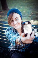 beautiful young blonde hipster woman selfie