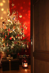 Door opening into a room decorated for Christmas