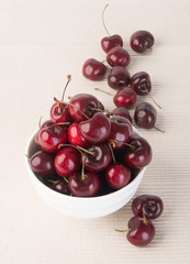 Obraz na płótnie Canvas Fresh cherry berry on background