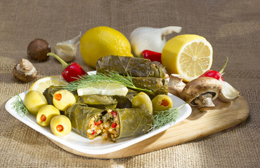 Grape leaves stuffed with rice.