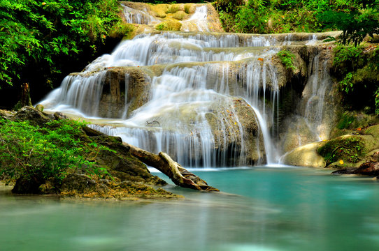 Green Waterfall in Tropical Rainforest © karinkamon