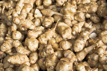 Closeup of fresh Jerusalem artichoke for sale.