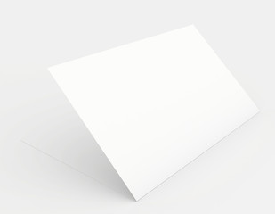 A white sheet of paper in soft shades of gray