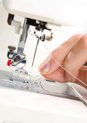 Image of seamstress working   on sewing machine