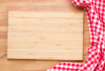 cutting board and  red napkin