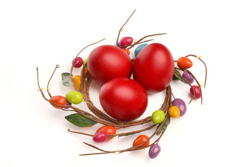 Red hand dyed easter eggs with circle easter egg nest decoration
