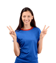 Happy girl with blue t-shirt signing victory.