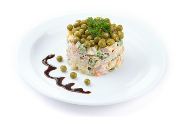 Russian traditional salad Olivier, isolated on white