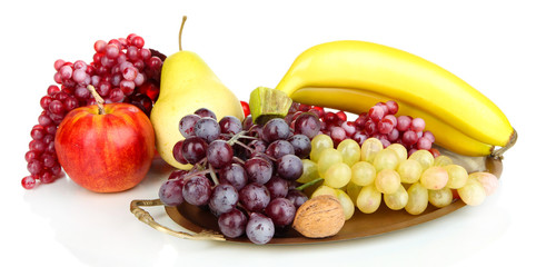 Golden tray with fruits isolated on white