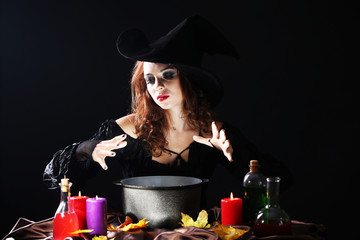 Halloween witch on black background