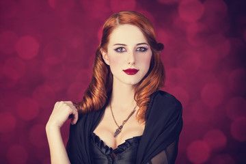 Portrait of a young redhead woman