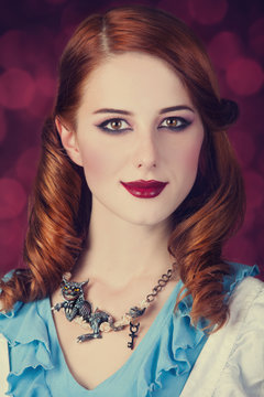 Portrait of a young redhead woman