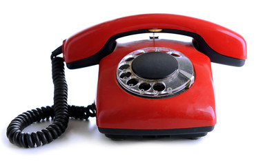 Red retro telephone, isolated on white