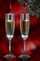 Flutes of champagne in holiday setting. Closeup.