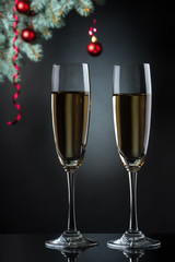 Flutes of champagne in holiday setting. Closeup.