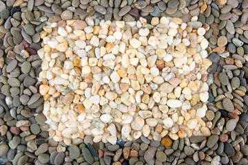 Frame of small sea stones, close up