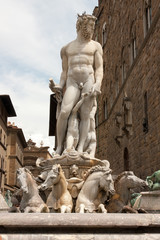 Florence - Statue of Neptune near fountain in Piazza della Signo