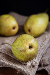 Fresh ripe pears on natural background.
