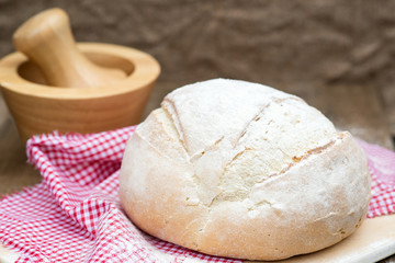 Fototapeta na wymiar Freshly baked French pain de campagne loaf of bread