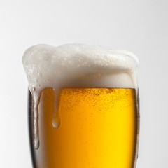 Beer in glass isolated on white background