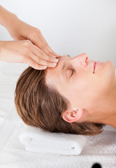 Fototapeta na wymiar Man Getting Head Massage