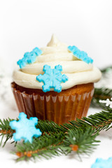 Cupcake with snowflake. Christmas theme.