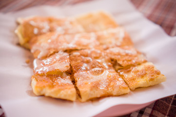 Pancakes with nuts and sugar caramel on top