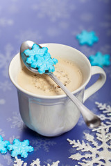 Cappuccino with snowflake shaped sugar cubes