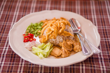 Spicy rice with chicken, eggs, pepper salad