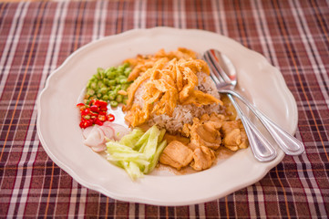 Spicy rice with chicken, eggs, pepper salad