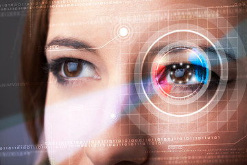Cyber woman with technolgy eye looking