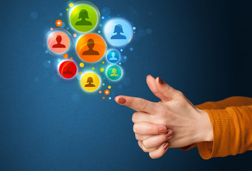 Social media icons coming out of gun shaped hand