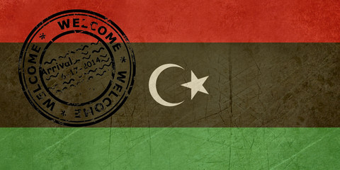 Welcome to Libya flag with passport stamp