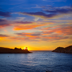 Naklejka na ściany i meble Menorca Zachód słońca w Cala Morell SES Torretes plaży