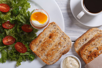 Salad of broccoli, tomato and lettuce and boiled egg