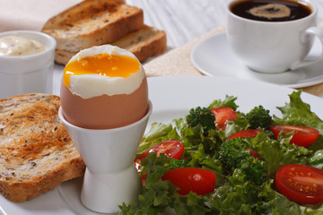 Very tasty and healthy breakfast. Egg, toast and salad