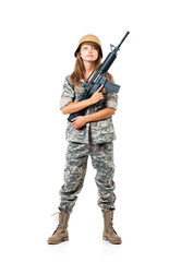 Soldier young beautiful girl dressed in a camouflage with a gun