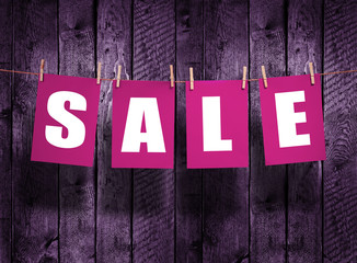   SALE on wood background