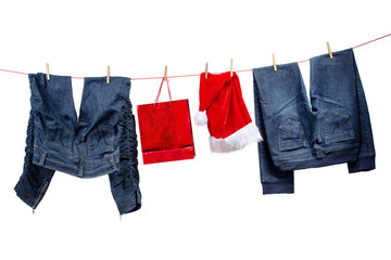 Jeans, with gift bag and santa hats on the clothesline