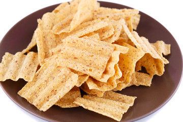 Wheat chips on plate