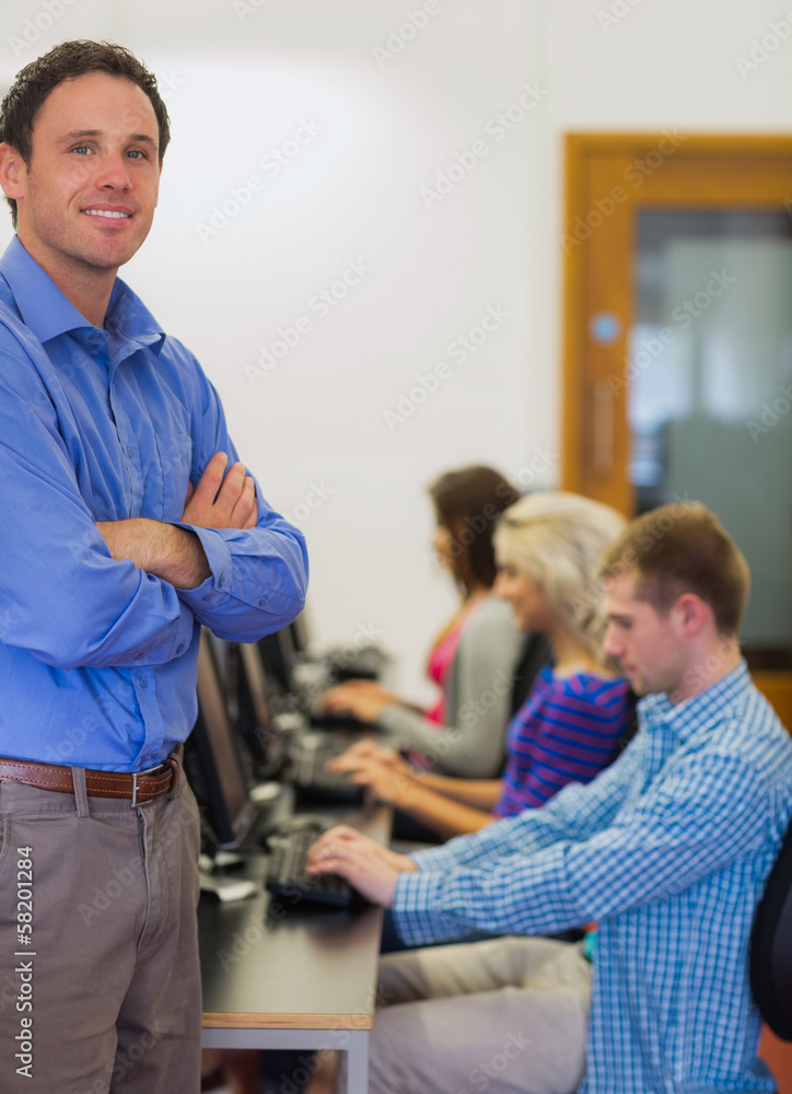 Aufkleber Teacher with students using computers in computer room